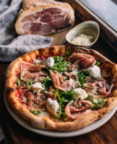A delicious pizza served at Farro Pizzeria, showcasing Italian flavours in Moonee Ponds.