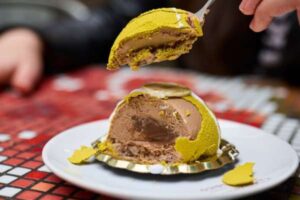 Exterior of Brunetti Moonee Ponds, a vibrant Italian café with stylish outdoor seating and a modern ambience.