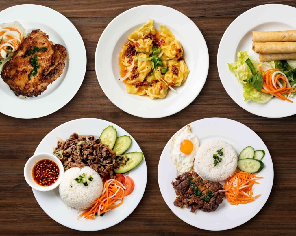 Vietnamese dishes including grilled chicken, wontons and rice plates at Pho M Viet Vietnamese restaurant Moonee Ponds